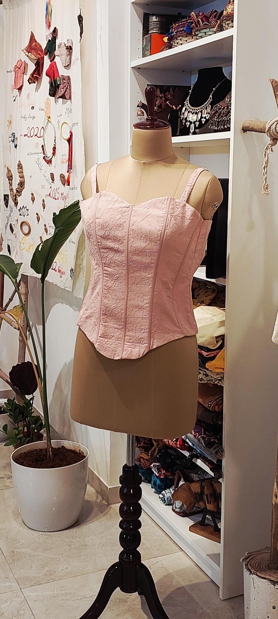 Achieve a perfect hourglass figure with designer custom fit corsets. Shop steel-boned corsets, waist cinchers, and luxury corset tops. Tailored for ultimate support and style. Shop the collection now!