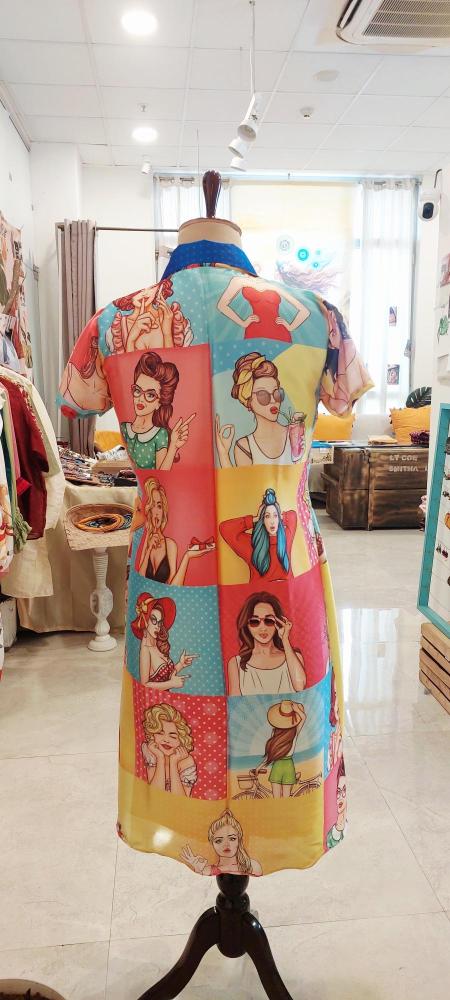 Shop our Pop Art Gallery Quirky Shirt midi Dress! A quirky, vibrant shirt dress featuring retro-chic illustrations and a flattering A-line fit. Perfect for making a statement at brunch or the office. Free shipping on orders over $100!
