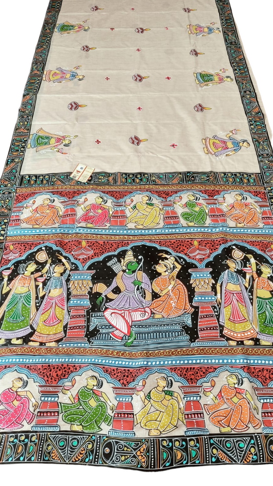 Hand-painted Pattachitra saree with Ram and Sita. Features traditional Indian folk art, colorful designs, and a unique pattern.