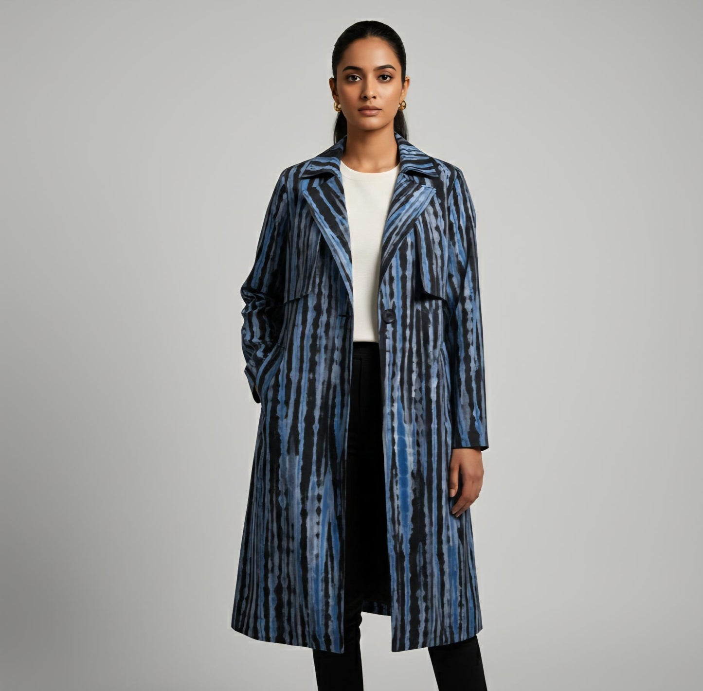 Shop Ranga Chakra's unique Shibori Trench Coat featuring a stunning hand-dyed lime green and indigo pattern. A luxury statement coat that defines artisan style. Limited stock.
