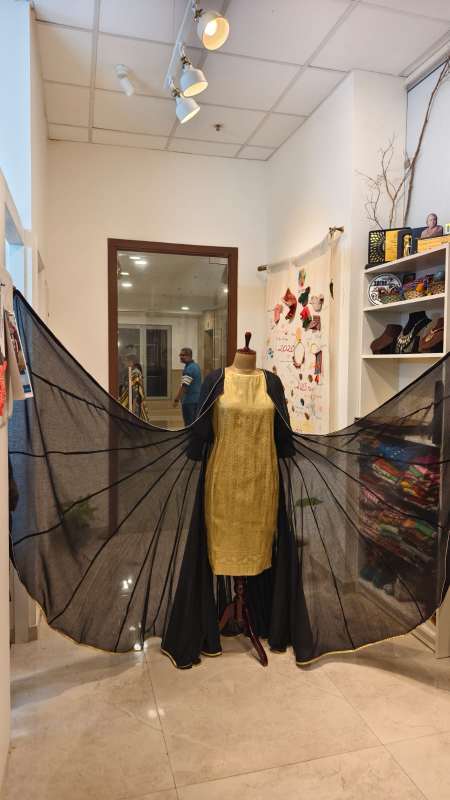 Regal Twilight: Golden Brocade Dress with black Mul Mul Cape