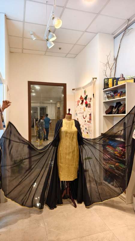 Regal Twilight: Golden Brocade Dress with black Mul Mul Cape