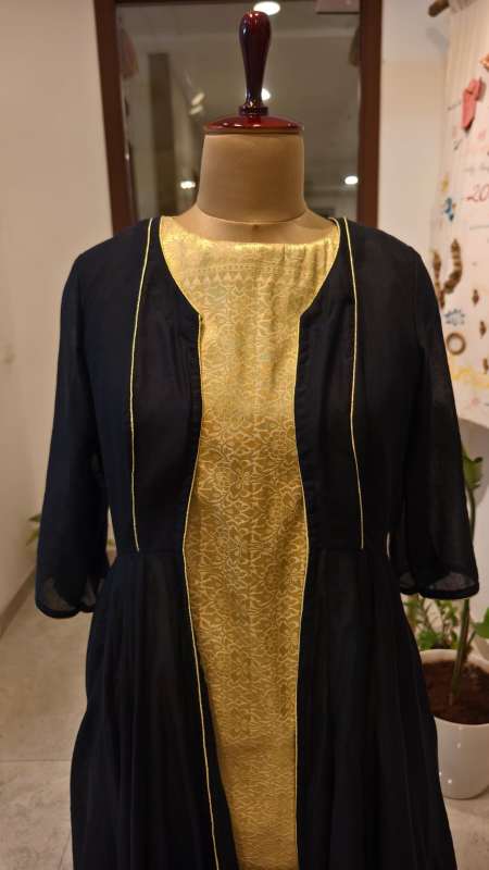 Regal Twilight: Golden Brocade Dress with black Mul Mul Cape