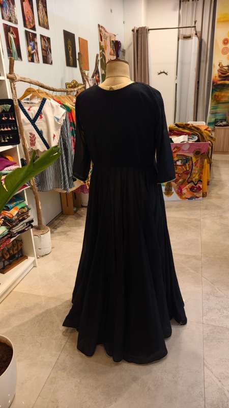 Regal Twilight: Golden Brocade Dress with black Mul Mul Cape
