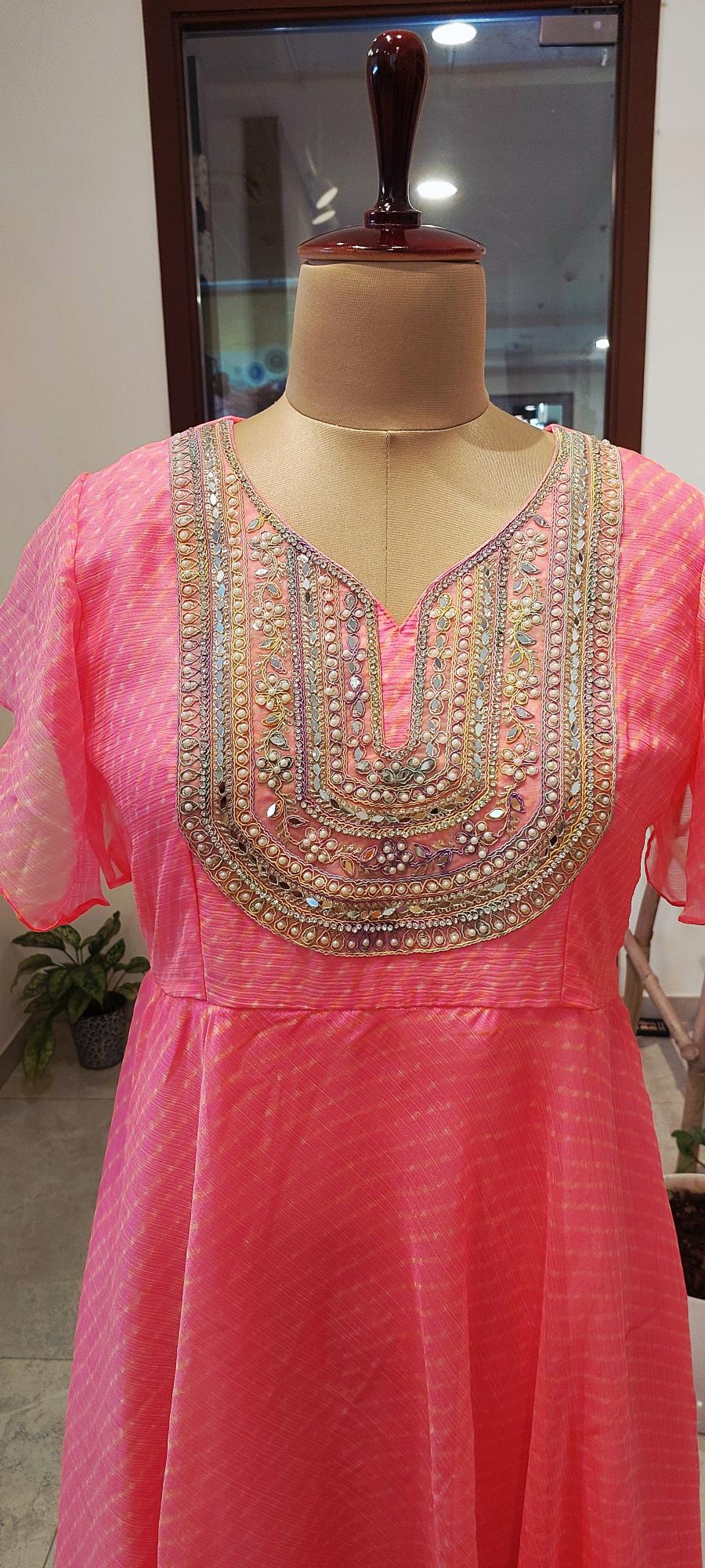 Festive Pink Chiffon Dress with Intricate Mirror Yoke