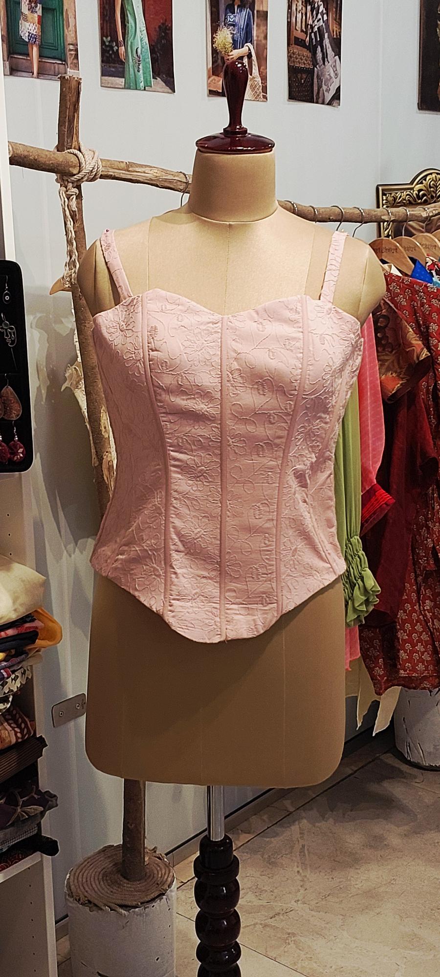 Achieve a perfect hourglass figure with designer custom fit corsets. Shop steel-boned corsets, waist cinchers, and luxury corset tops. Tailored for ultimate support and style. Shop the collection now!