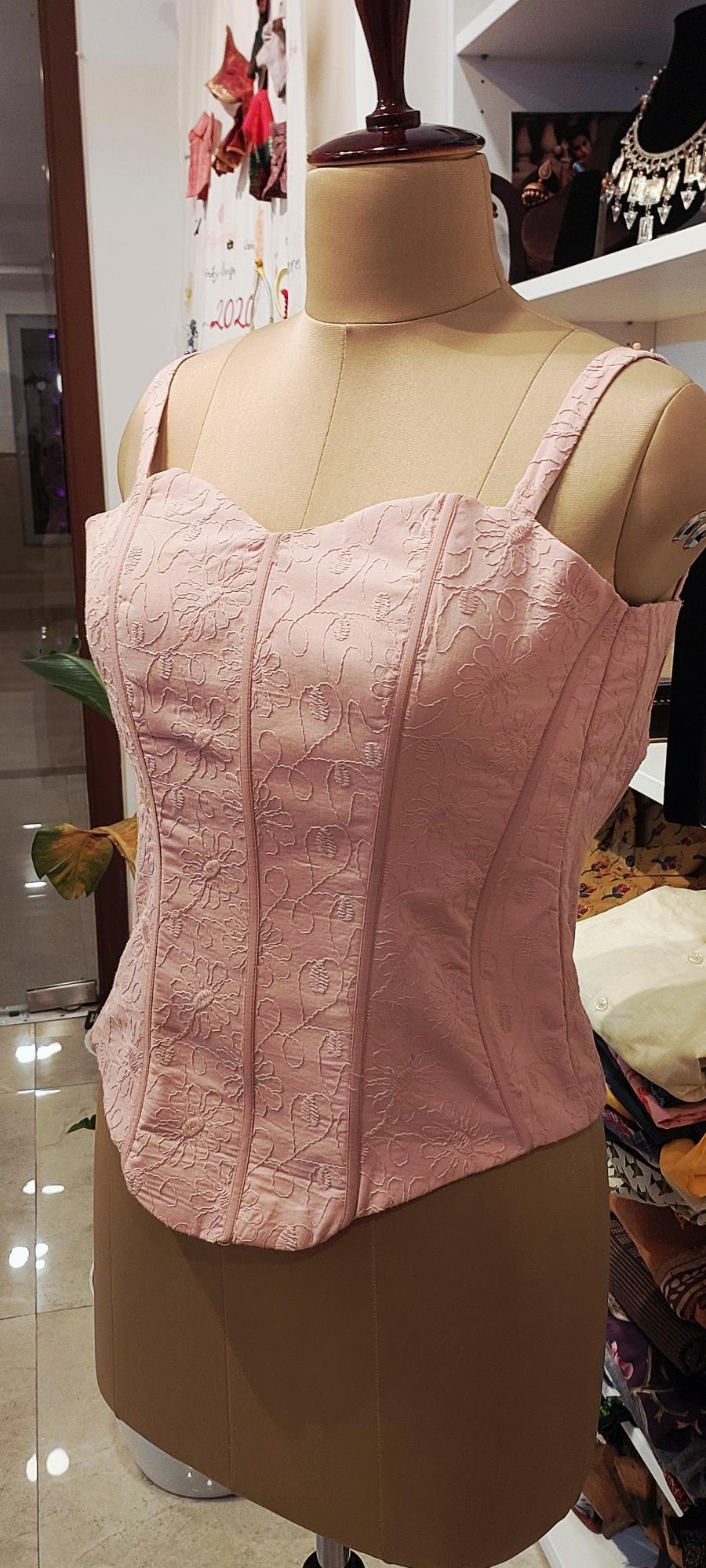 Achieve a perfect hourglass figure with designer custom fit corsets. Shop steel-boned corsets, waist cinchers, and luxury corset tops. Tailored for ultimate support and style. Shop the collection now!