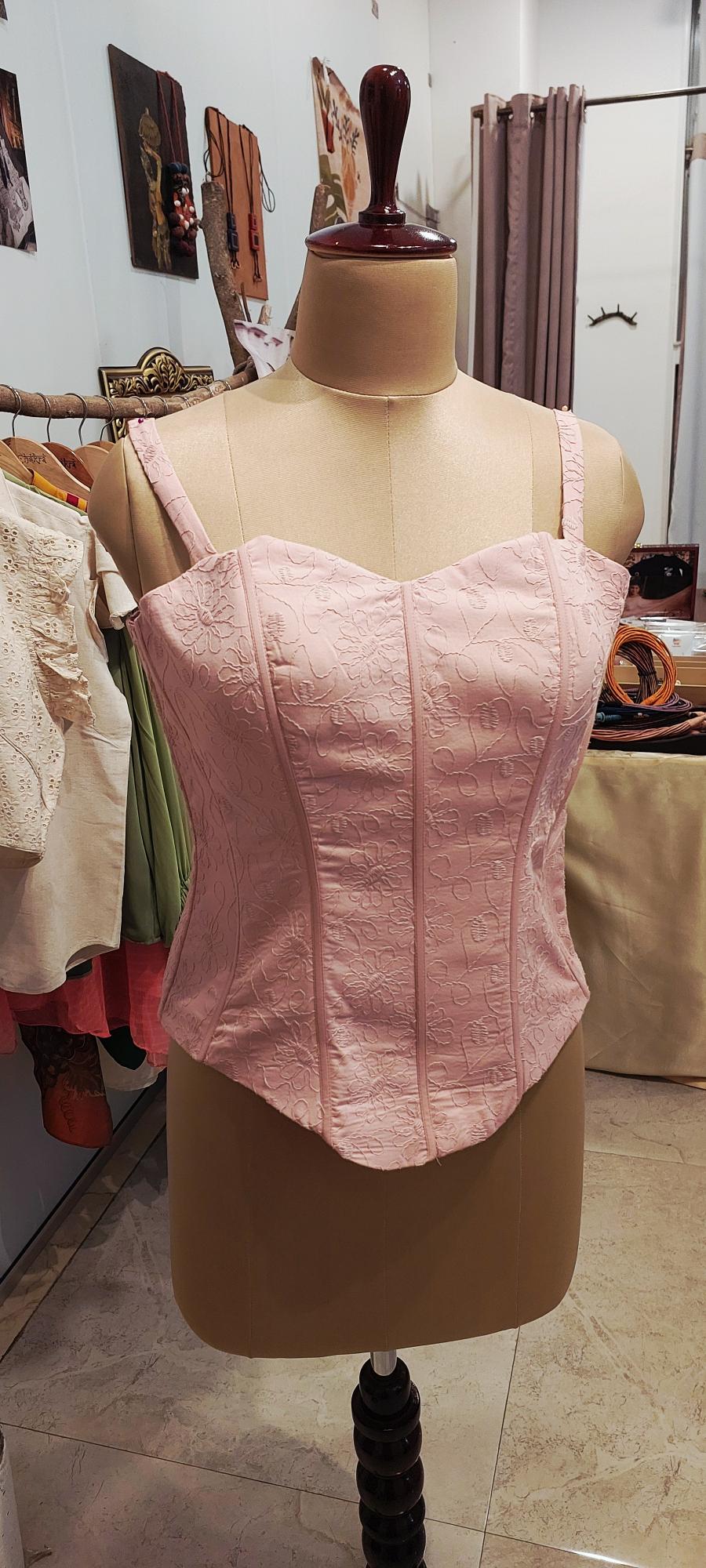 Achieve a perfect hourglass figure with designer custom fit corsets. Shop steel-boned corsets, waist cinchers, and luxury corset tops. Tailored for ultimate support and style. Shop the collection now!