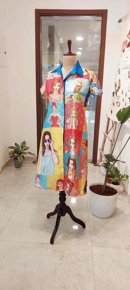 Shop our Pop Art Gallery Quirky Shirt midi Dress! A quirky, vibrant shirt dress featuring retro-chic illustrations and a flattering A-line fit. Perfect for making a statement at brunch or the office. Free shipping on orders over $100!
​