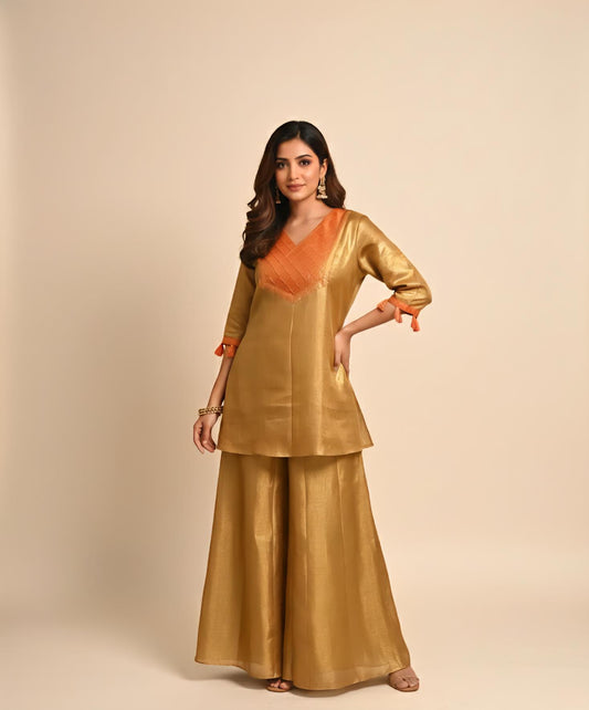 ​Gold Co-ord Set ,Festive Kurta Set , Designer Tunic with Palazzos Metallic Ethnic Wear Wedding Guest Outfit Haldi Outfit Ideas Party Wear Suits for Women Silk Blend Tunic Set Wide Leg Pants Set Indo-Western Fusion Wear Tassel Sleeve Kurta Mustard Gold Suit Short Kurta Palazzo Set Trendy Ethnic Wear 2026