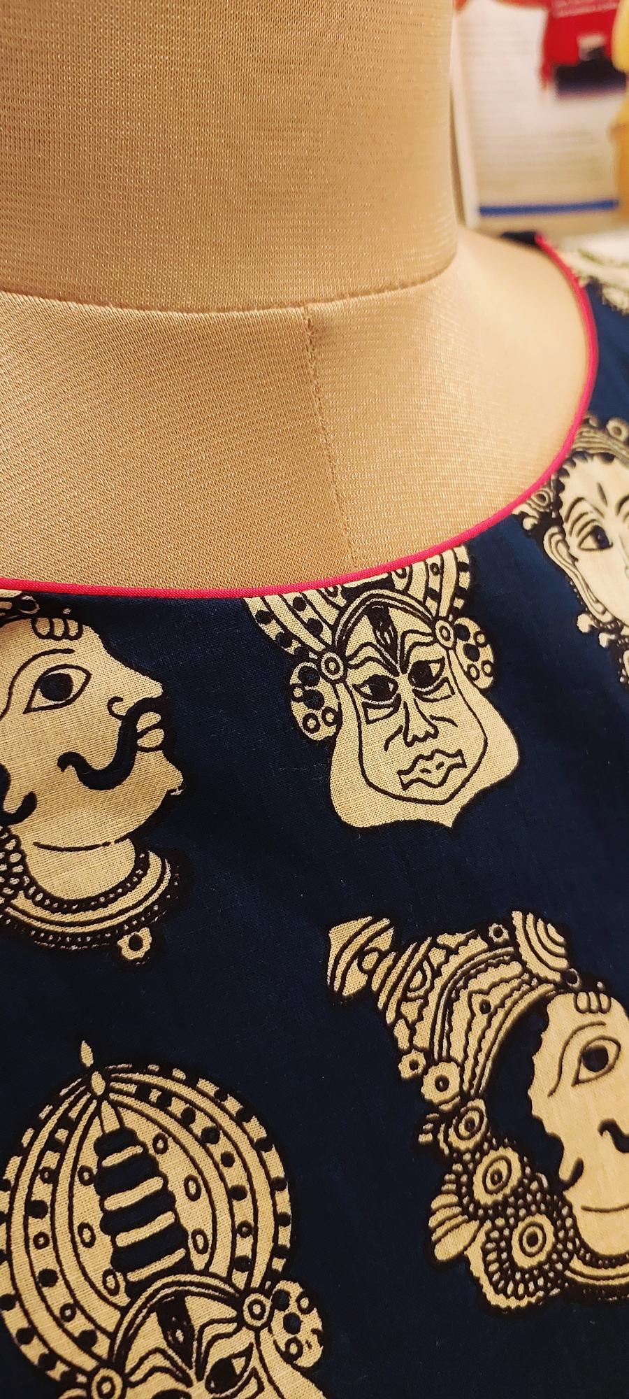Shop our Stunning kalamkari cotton Handcrafted Indigo Kalamkari Kathakali face block Dress. Hand crafted from soft organic Mul Cotton, our Indigo Kalamkari Maxi dress is the epitome of comfort and style. Dress in style with Ranga Chakra