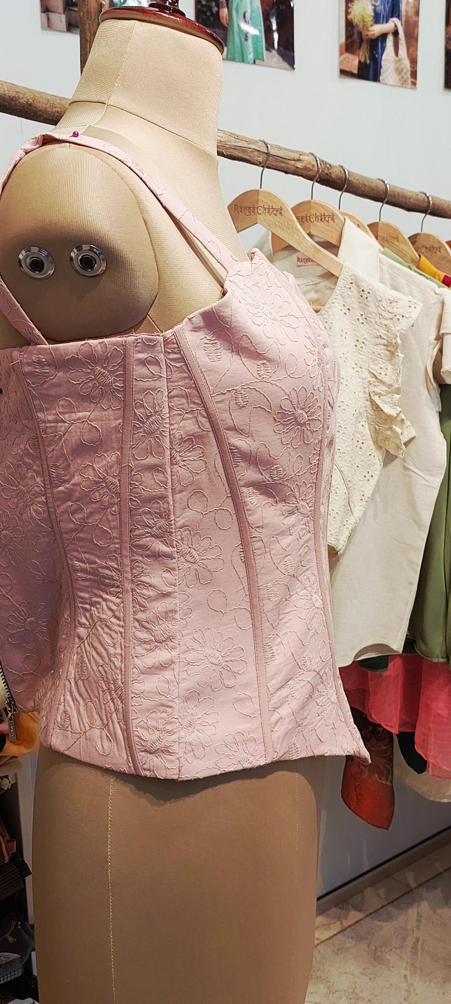 Achieve a perfect hourglass figure with designer custom fit corsets. Shop steel-boned corsets, waist cinchers, and luxury corset tops. Tailored for ultimate support and style. Shop the collection now!