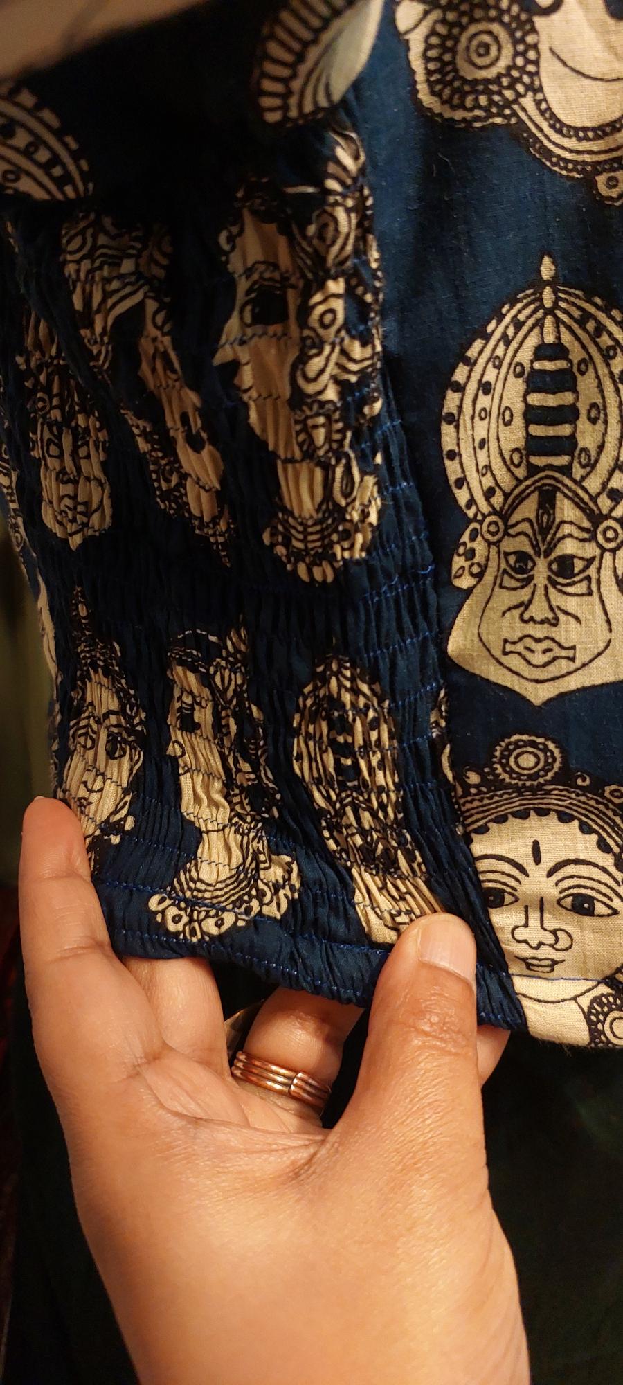 Shop our Pure Cotton Smocked readymade blouses. Wear Blouses like A tee! Get the perfect, bespoke fit for handloom sarees. Shop the latest trends in readymade Smocking blouses  and made-to-order styles. Shop now and experience luxury tailoring. Handloom Kalamkari printed Cotton Indigo shade mix Matched Blouse with princess cut , lining and no hook. Wear like a T shirt